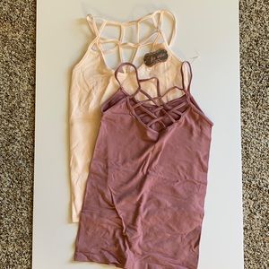 Suzette stretchy strappy tanks. 1 NWT light pink, 1 dusty rose. Size OS